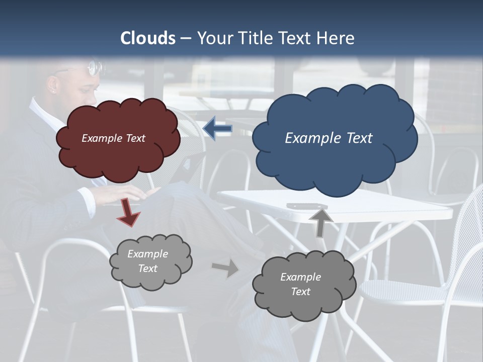 A Man In A Suit Sitting At A Table With A Laptop PowerPoint Template