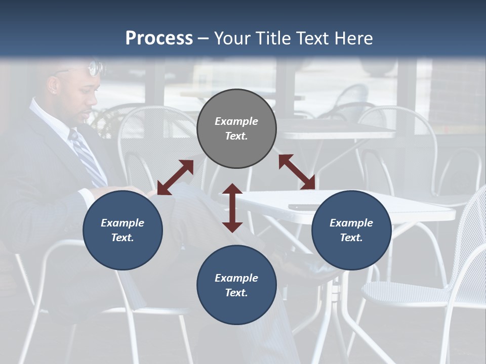 A Man In A Suit Sitting At A Table With A Laptop PowerPoint Template