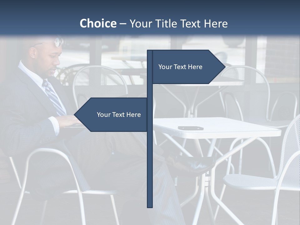 A Man In A Suit Sitting At A Table With A Laptop PowerPoint Template