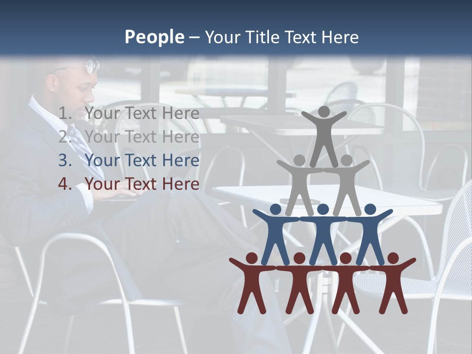 A Man In A Suit Sitting At A Table With A Laptop PowerPoint Template