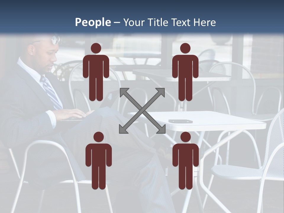 A Man In A Suit Sitting At A Table With A Laptop PowerPoint Template