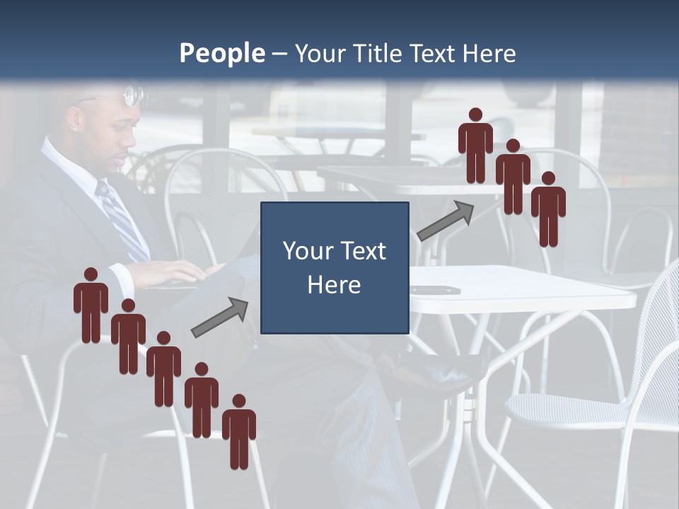 A Man In A Suit Sitting At A Table With A Laptop PowerPoint Template