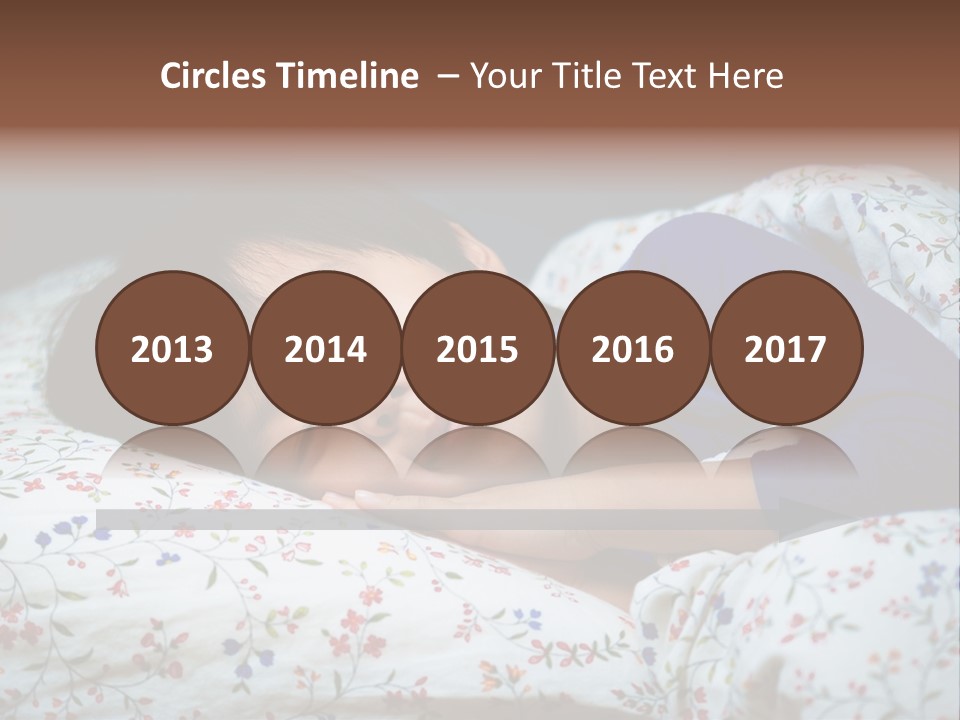 A Young Boy Sleeping On A Bed With A Pillow PowerPoint Template