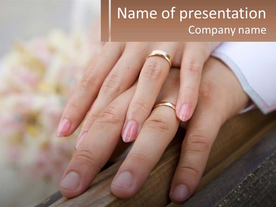 A Couple Holding Hands With Wedding Rings On Them PowerPoint Template