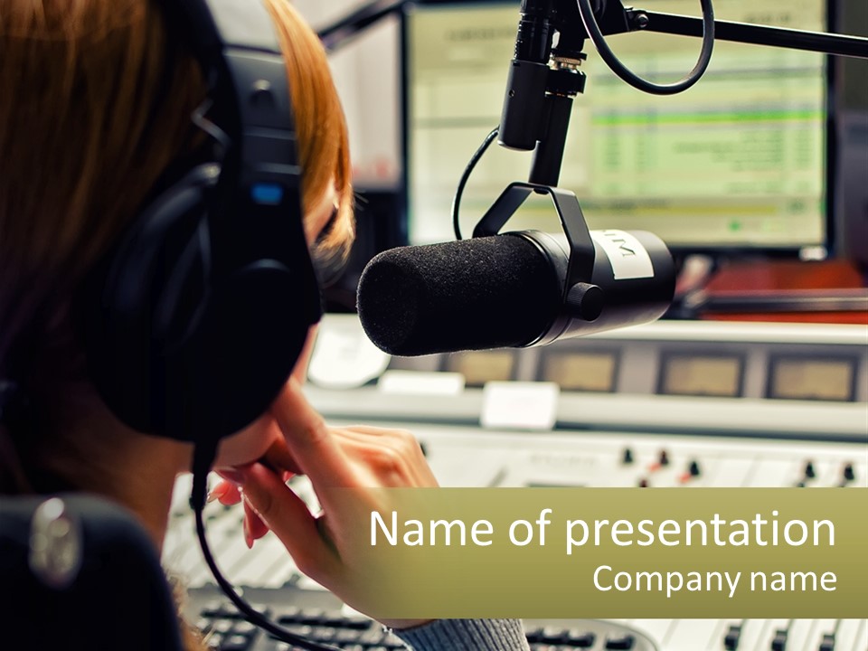 A Woman In A Recording Studio With Headphones On PowerPoint Template