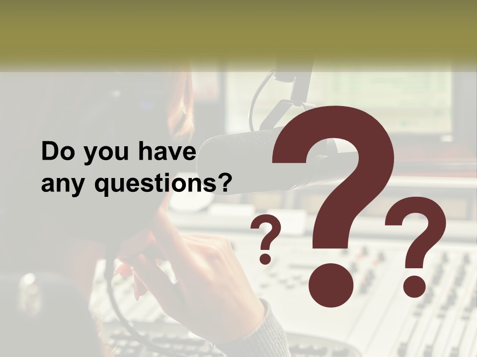 A Woman In A Recording Studio With Headphones On PowerPoint Template