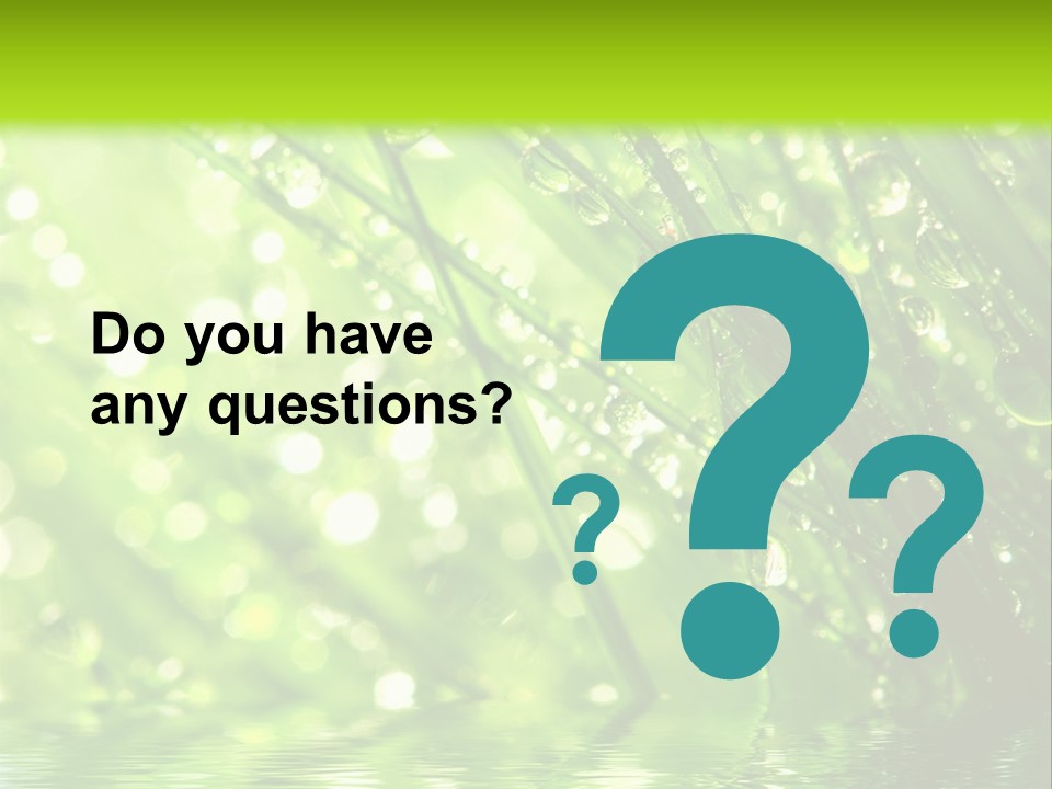 A Green Grass With Water Drops On It PowerPoint Template