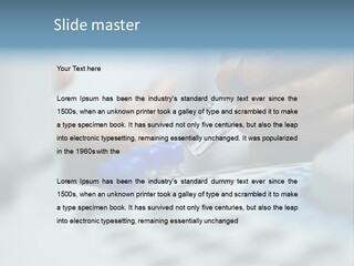 A Person Holding A Small Device In Their Hands PowerPoint Template