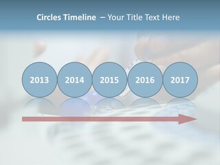 A Person Holding A Small Device In Their Hands PowerPoint Template