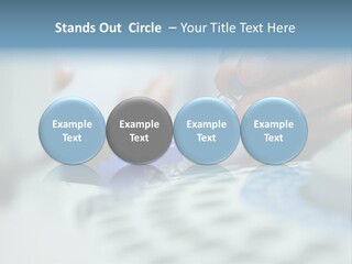 A Person Holding A Small Device In Their Hands PowerPoint Template