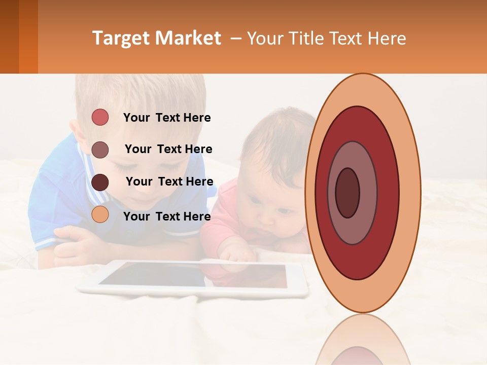 Two Children Laying On A Bed Playing With A Tablet PowerPoint Template