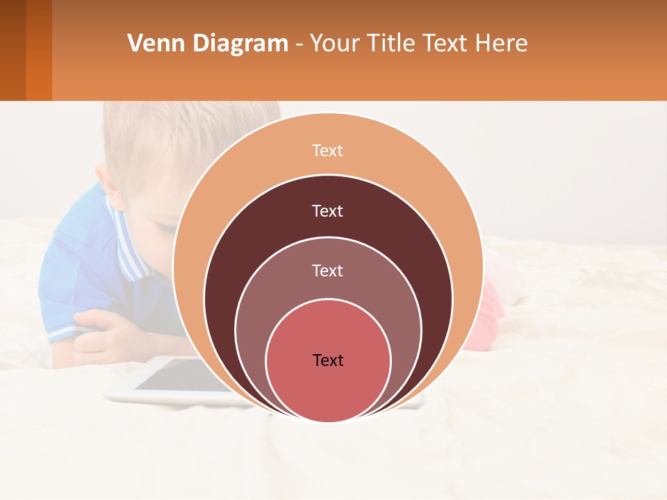 Two Children Laying On A Bed Playing With A Tablet PowerPoint Template