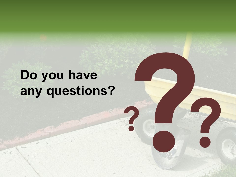 A Yellow Wheelbarrow With A Shovel On A Sidewalk PowerPoint Template