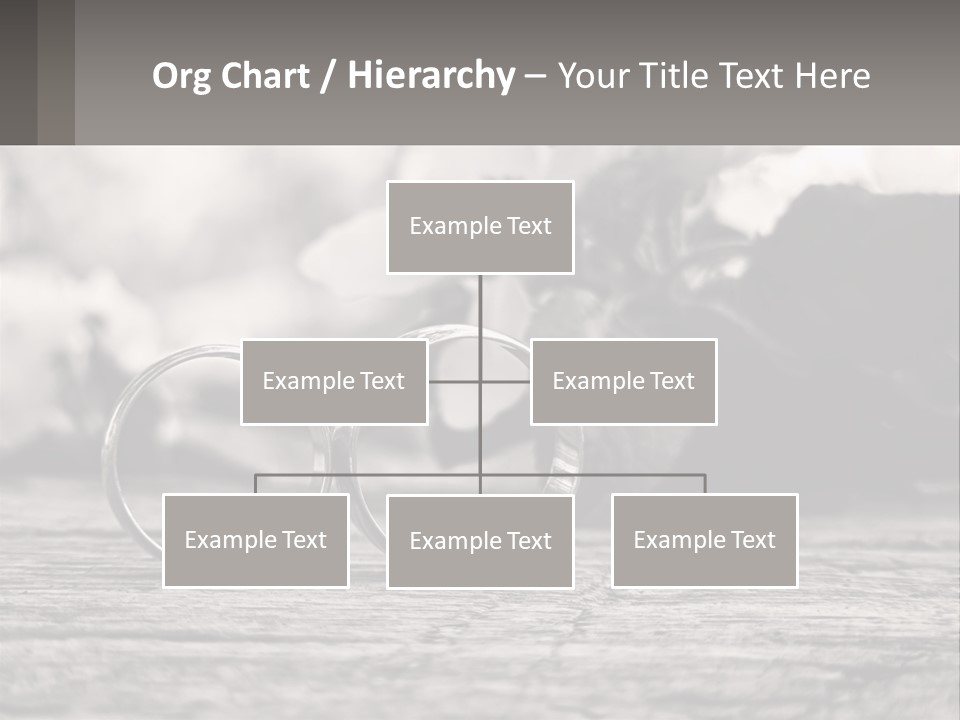 Two Wedding Rings Sitting On Top Of A Wooden Table PowerPoint Template