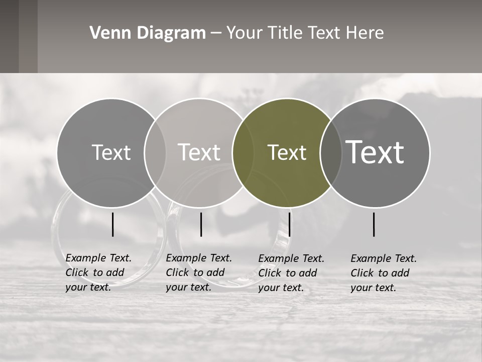 Two Wedding Rings Sitting On Top Of A Wooden Table PowerPoint Template