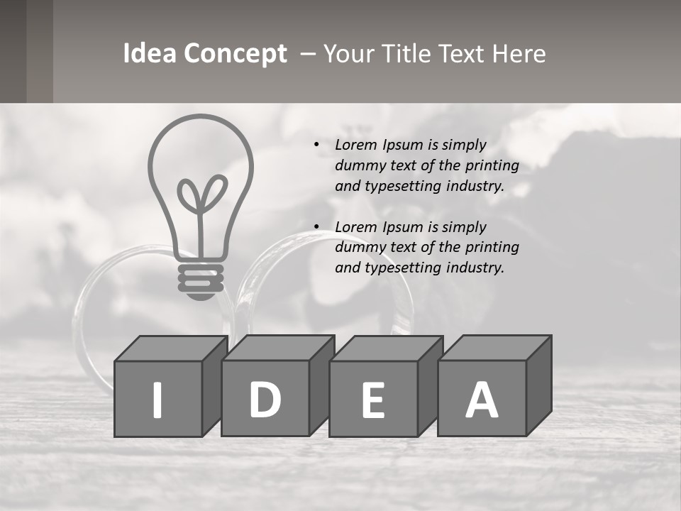 Two Wedding Rings Sitting On Top Of A Wooden Table PowerPoint Template