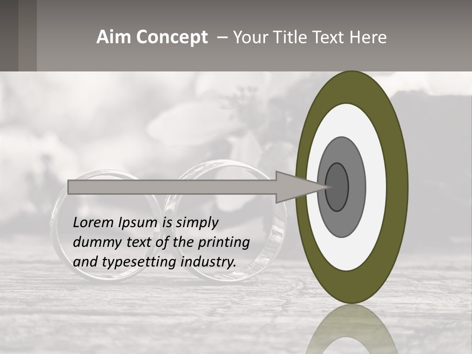 Two Wedding Rings Sitting On Top Of A Wooden Table PowerPoint Template