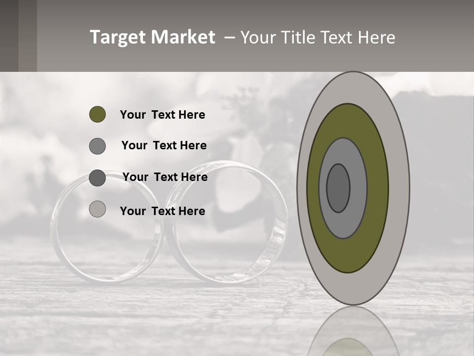 Two Wedding Rings Sitting On Top Of A Wooden Table PowerPoint Template