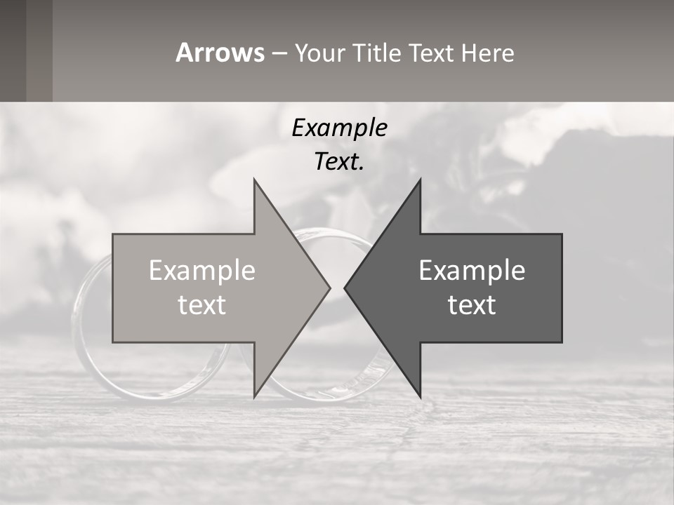 Two Wedding Rings Sitting On Top Of A Wooden Table PowerPoint Template