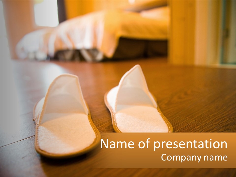 A Pair Of White Shoes Sitting On Top Of A Wooden Floor PowerPoint Template