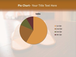 A Pair Of White Shoes Sitting On Top Of A Wooden Floor PowerPoint Template