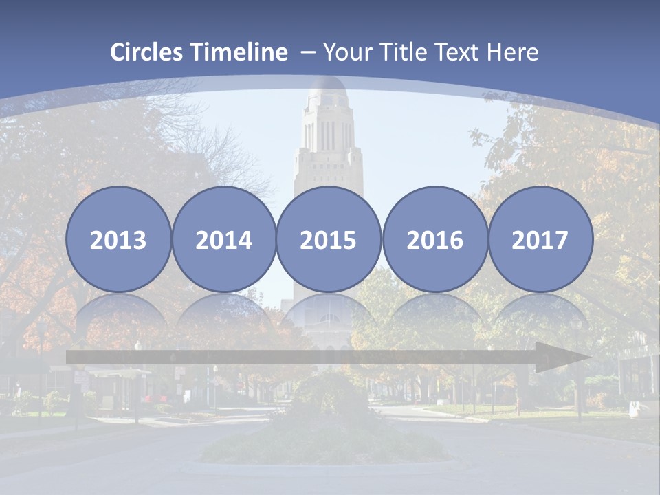 A City Street With A Tall Tower In The Background PowerPoint Template