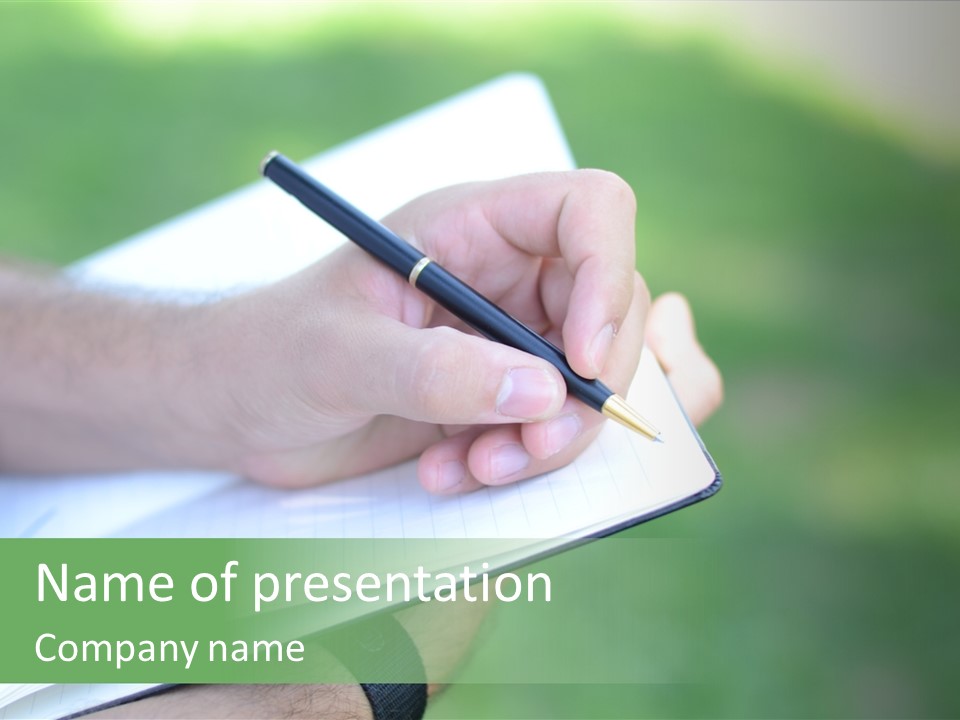 A Person Writing On A Notebook With A Pen PowerPoint Template