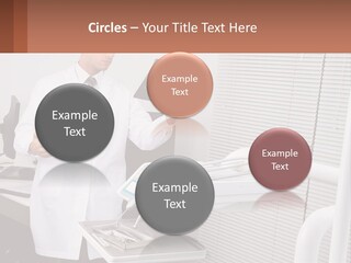 A Man In A White Lab Coat Holding A Tablet PowerPoint Template