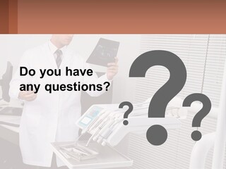 A Man In A White Lab Coat Holding A Tablet PowerPoint Template