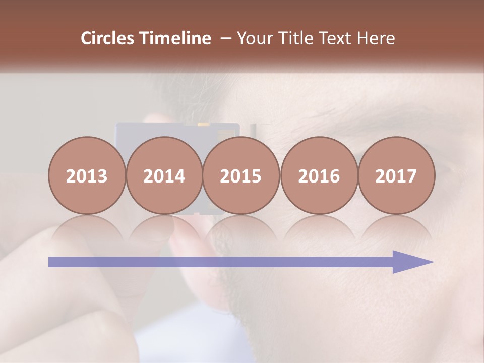 A Man Holding Up A Chip To His Eye PowerPoint Template