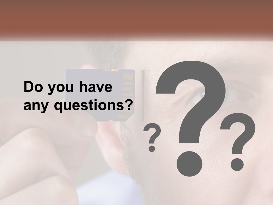 A Man Holding Up A Chip To His Eye PowerPoint Template