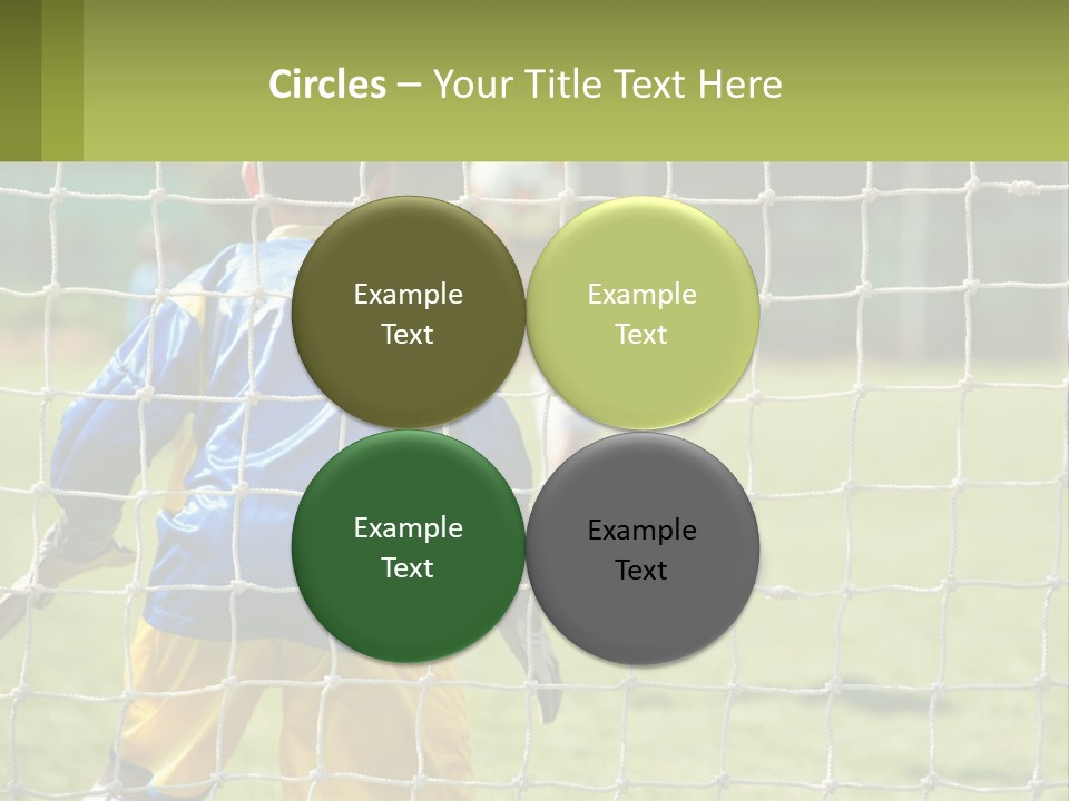 A Young Boy Kicking A Soccer Ball Towards A Goal PowerPoint Template