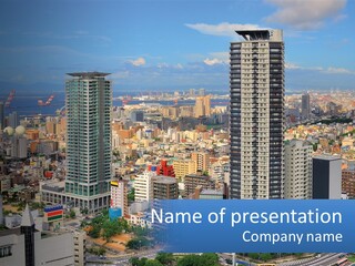 A Large City With Tall Buildings And A Blue Sky PowerPoint Template