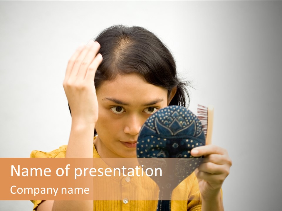 A Woman Is Holding A Hair Brush And Comb PowerPoint Template