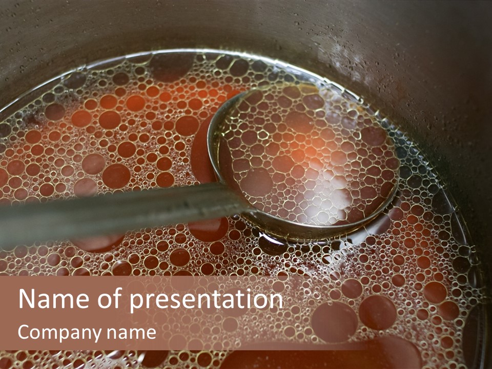 A Spoon In A Pot Filled With Liquid PowerPoint Template