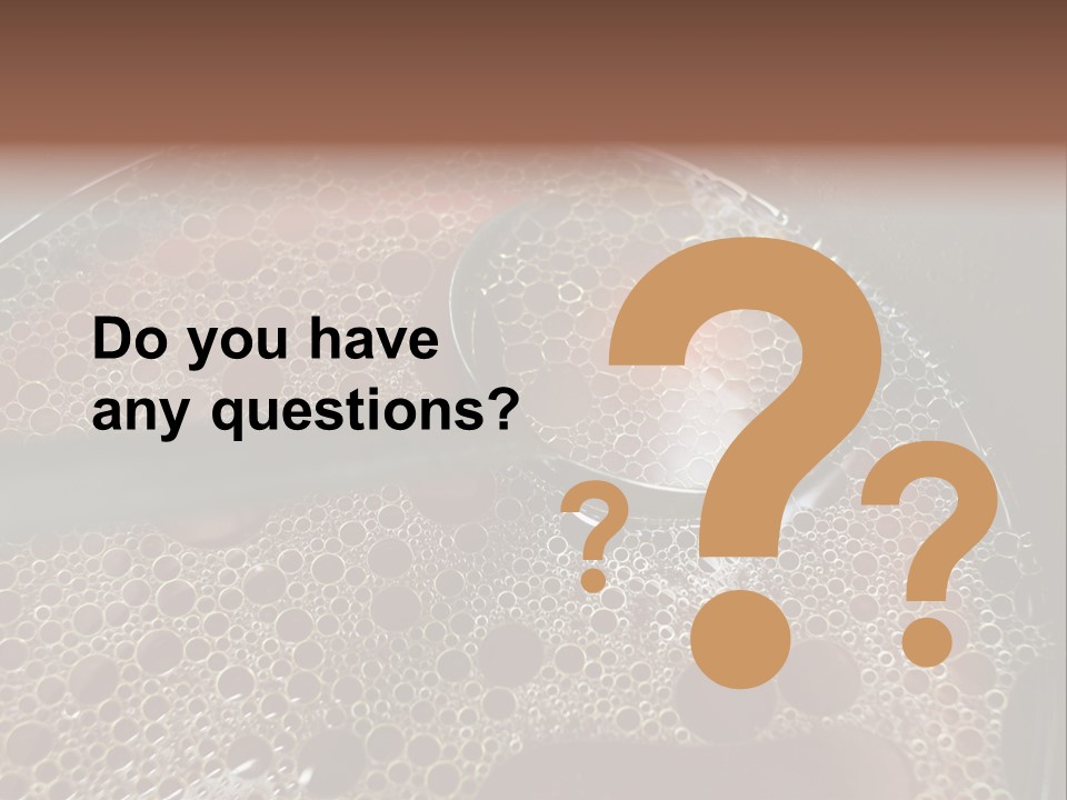 A Spoon In A Pot Filled With Liquid PowerPoint Template