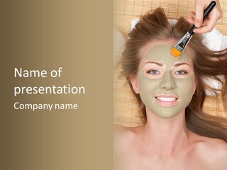 A Woman Getting A Facial Mask On Her Face PowerPoint Template