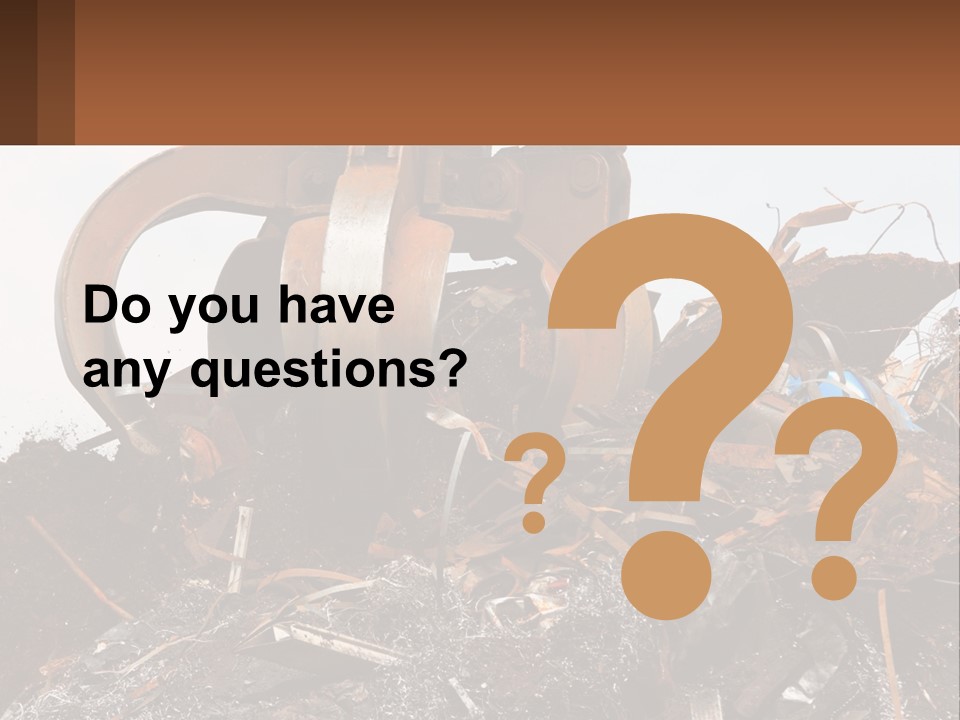 A Pile Of Dirt With A Large Metal Ball On Top Of It PowerPoint Template