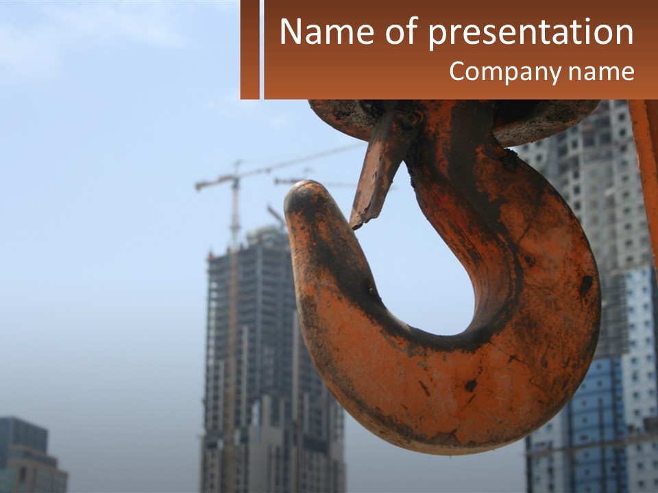 A Rusted Chain With A Building In The Background PowerPoint Template