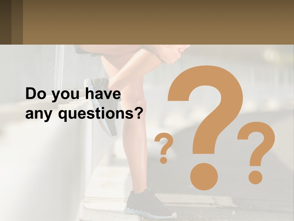 A Person Sitting On A Wall With Their Legs Crossed PowerPoint Template