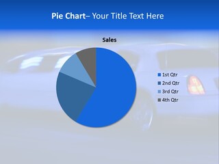 A Blue Car Driving Down A Street At Night PowerPoint Template