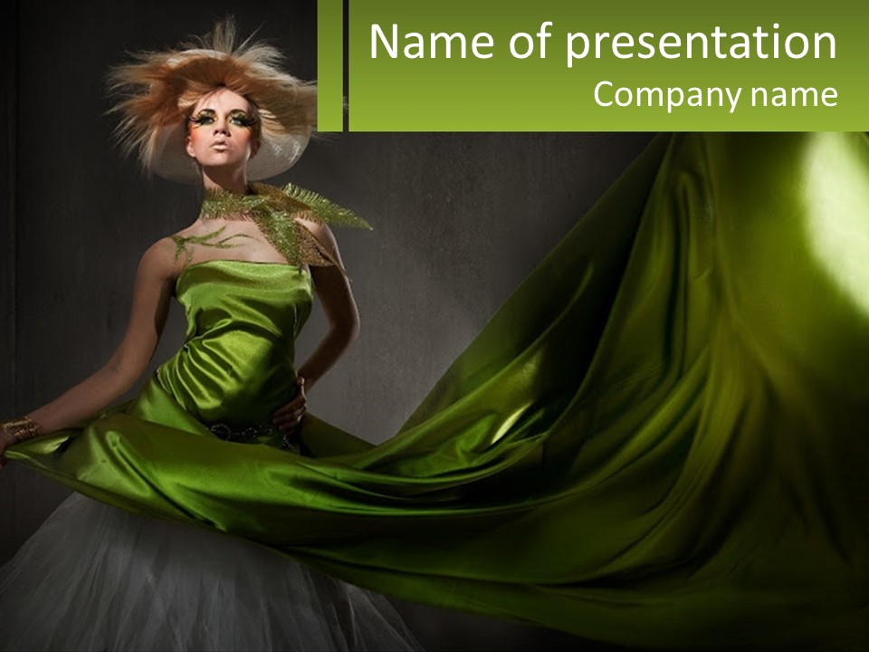 A Woman In A Green Dress Is Posing For A Picture PowerPoint Template