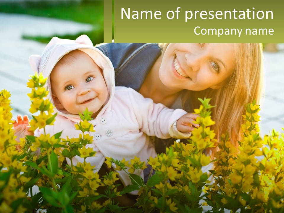 A Woman Holding A Baby In A Field Of Flowers PowerPoint Template