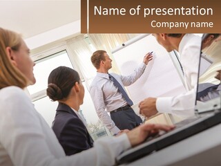 A Group Of Business People In A Meeting PowerPoint Template