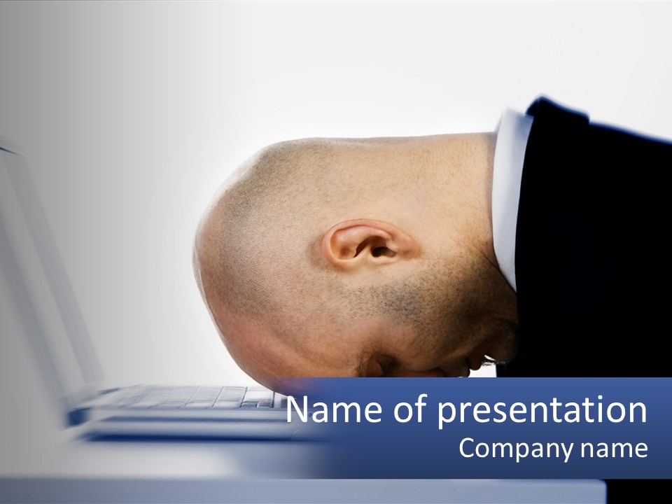 A Man With His Head On A Laptop Keyboard PowerPoint Template