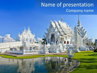 A Large White Building With A Pond In Front Of It PowerPoint Template