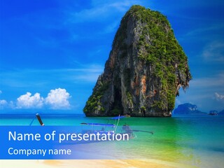 A Boat In The Ocean With A Mountain In The Background PowerPoint Template