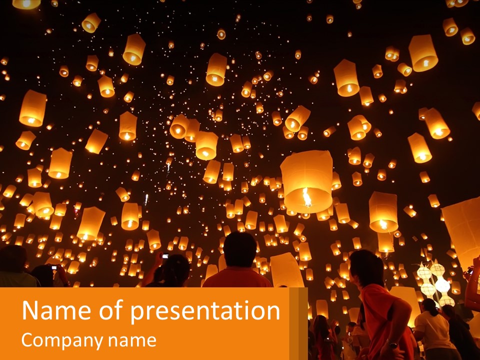 A Group Of People Standing In Front Of A Sky Full Of Lanterns PowerPoint Template