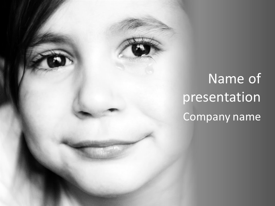 A Young Girl Smiling For The Camera With A Gray Background PowerPoint Template