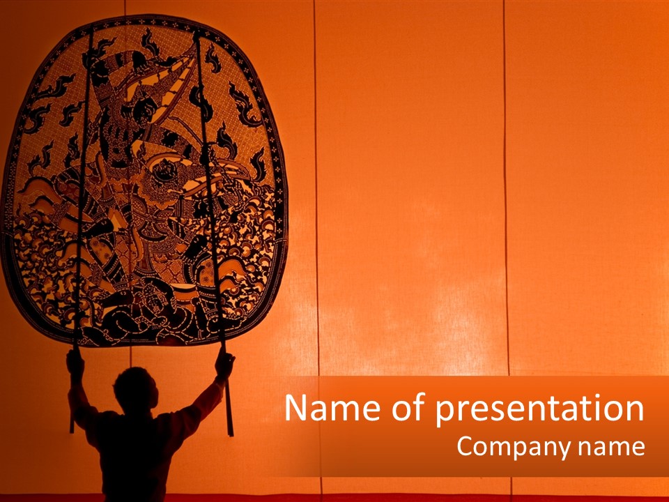 A Man Holding Up A Large Piece Of Art PowerPoint Template